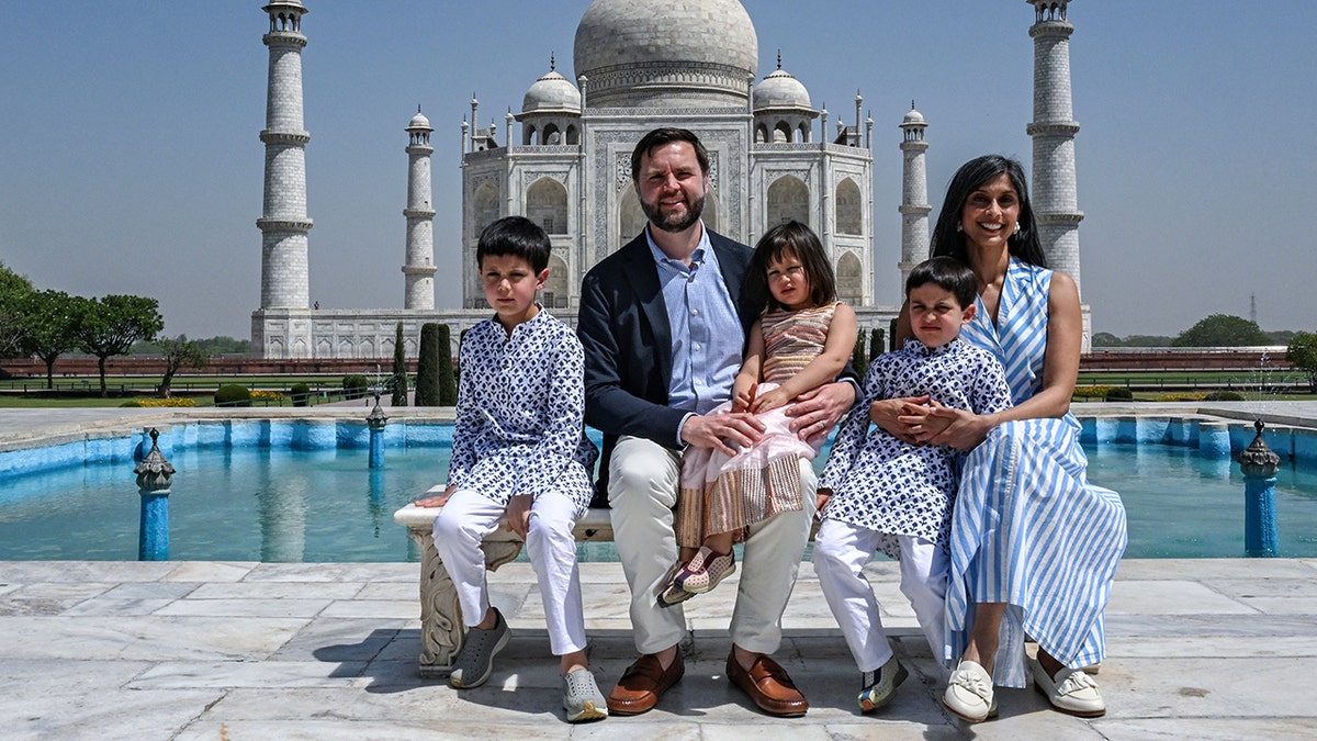 Vice President JD Vance and his family, including wife Usha Vance and their three children posing for a photo outside the Taj Mahal