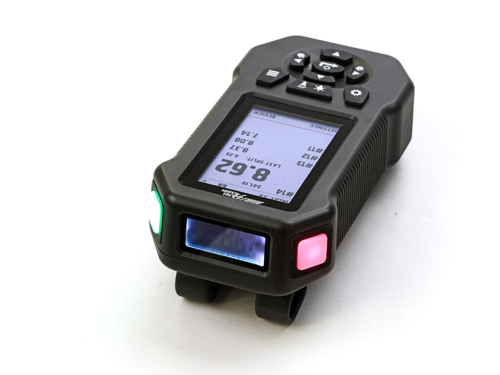 The top side of the Double Alpha EDGE Shot Timer on a white background.