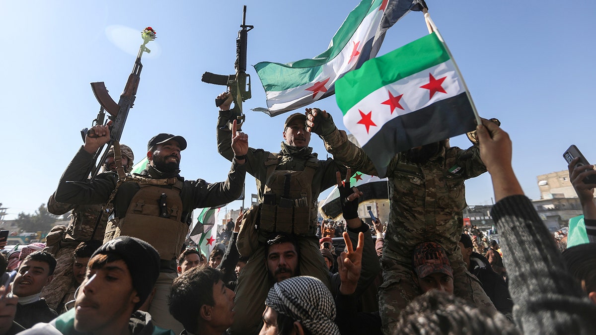 Syrian army forces celebrating.